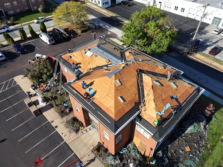 Bank exterior renovation with new roof and windows in Phoenixville, Pennsylvania by Lemus Construction
