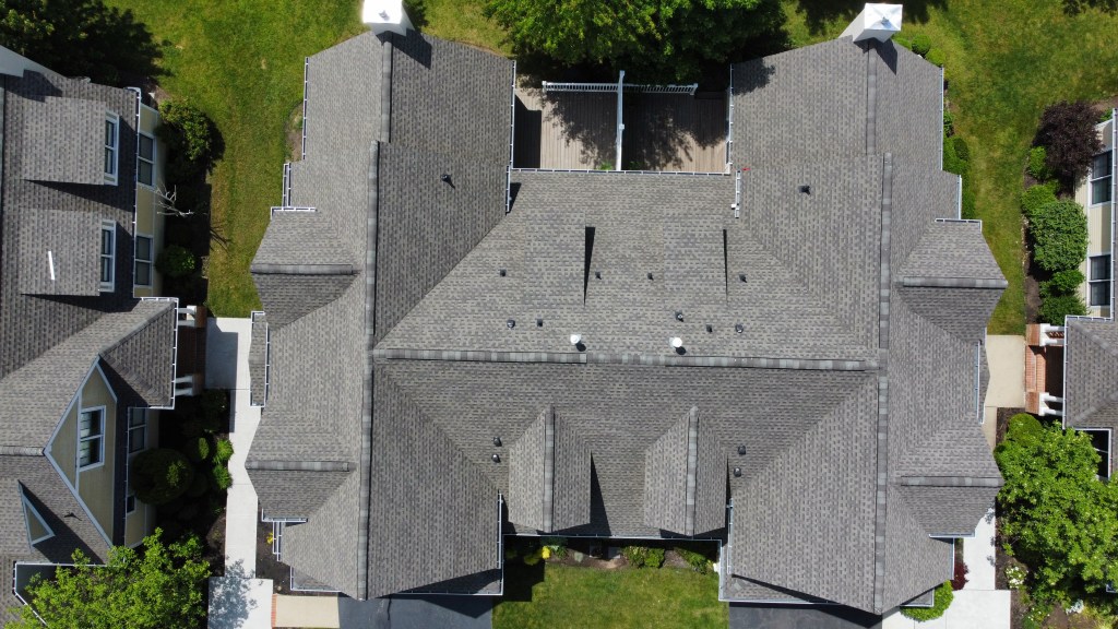 Completed roof sections with Lemus Construction crew on-site, Applebrook Carriage Homes, Malvern PA