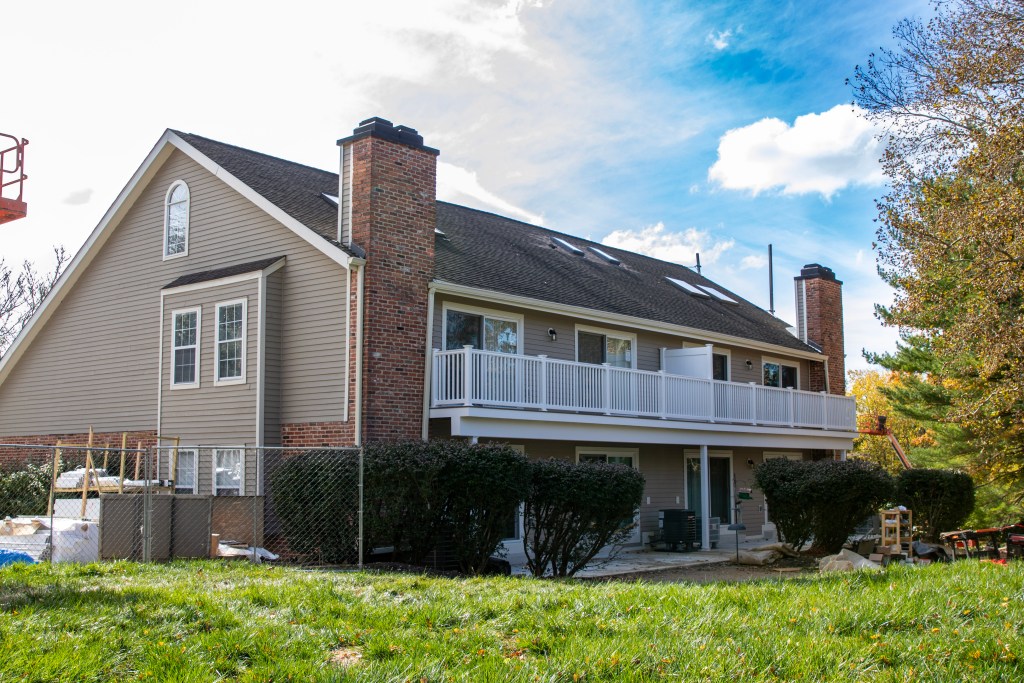 Newly installed CertainTeed siding panels on Cheswold Village condominium units
