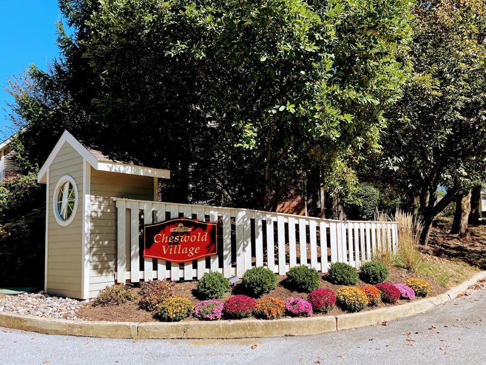 Cheswold Village community entrance sign in Chesterbrook, Pennsylvania, welcoming residents and visitors.